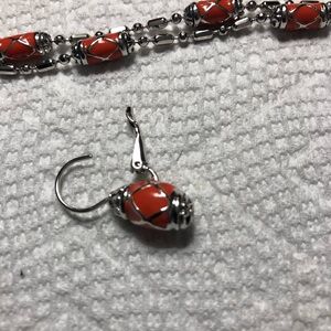 John Medeiros coral colored bracelet and earring set